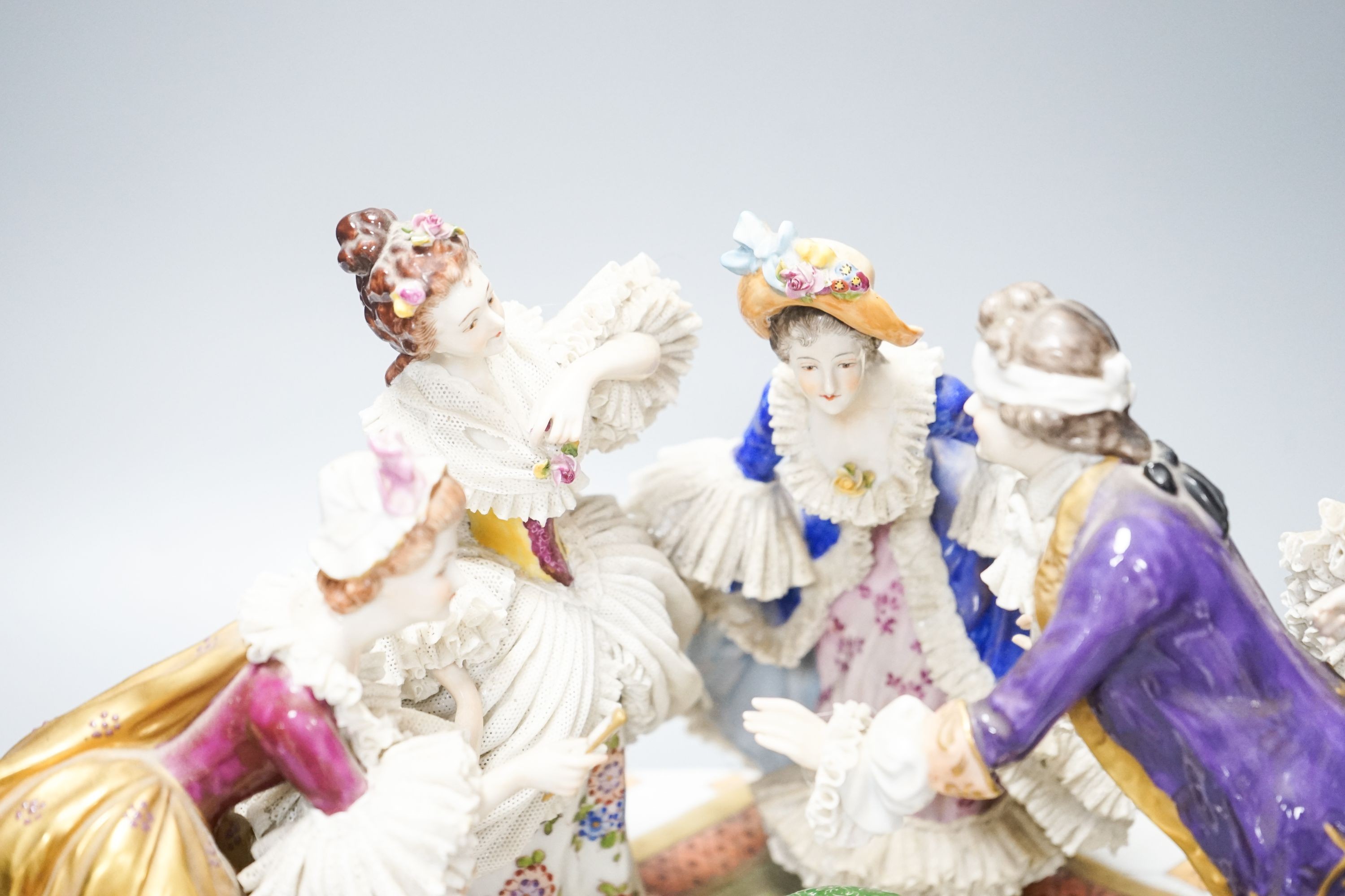 A large German porcelain ‘Blindman’s bluff’ group 46cm